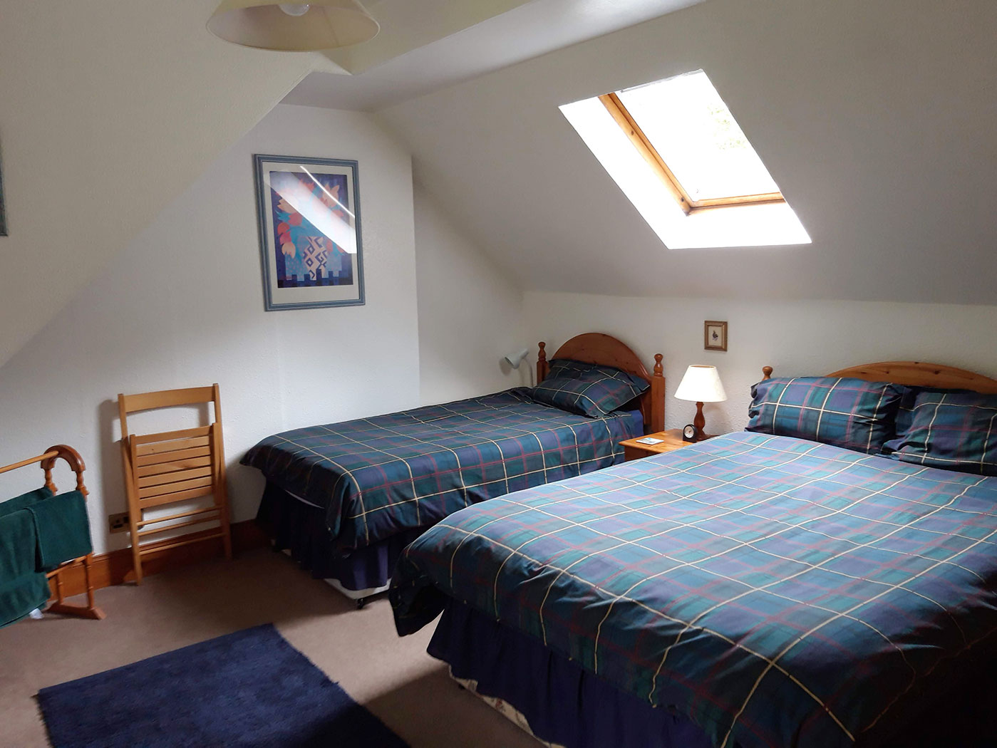 Main Bedroom with double bed and single bed